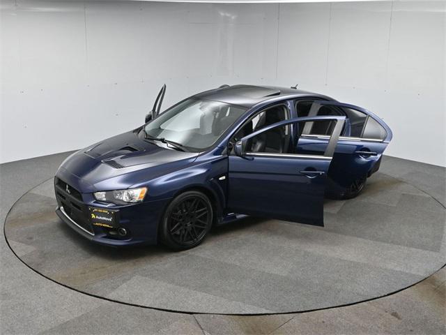 Photo of 2013 Cosmic Blue Pearl Mitsubishi Lancer Evolution