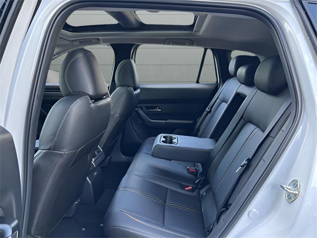 Photo of 2025 Wind Chill Pearl Mazda CX-50 Hybrid
