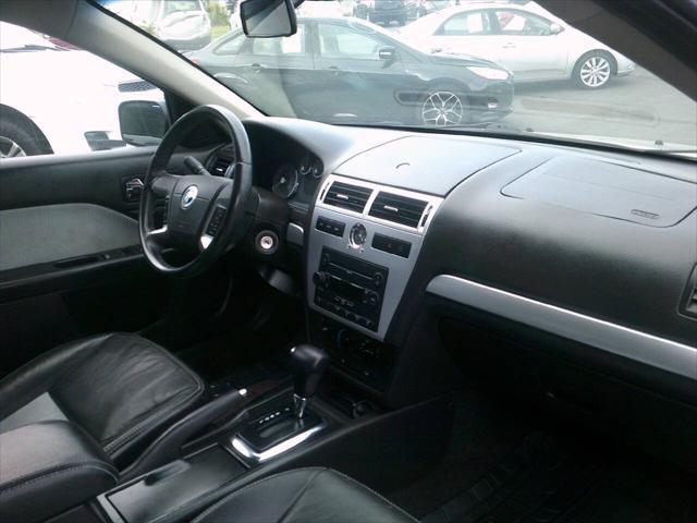 Photo of 2007 Dune Pearl Clearcoat Metallic Mercury Milan