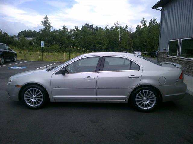 Photo of 2007 Dune Pearl Clearcoat Metallic Mercury Milan