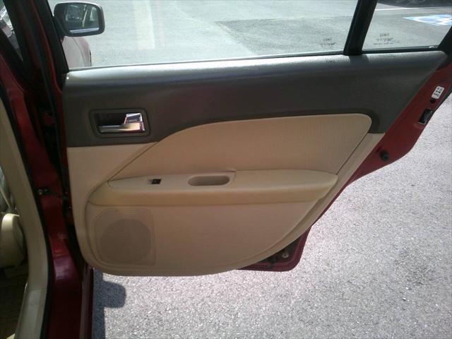 Photo of 2008 Vivid Red Clearcoat Metallic Mercury Milan