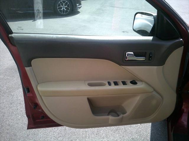 Photo of 2008 Vivid Red Clearcoat Metallic Mercury Milan
