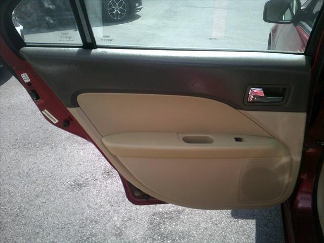 Photo of 2008 Vivid Red Clearcoat Metallic Mercury Milan