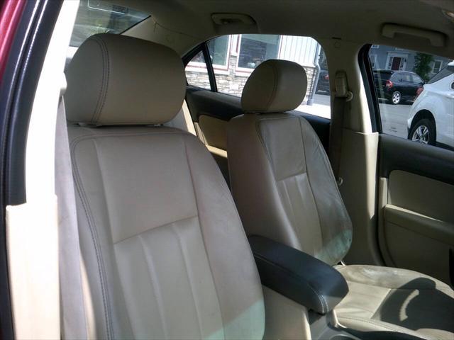 Photo of 2008 Vivid Red Clearcoat Metallic Mercury Milan