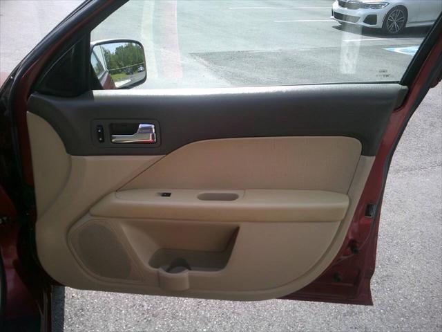 Photo of 2008 Vivid Red Clearcoat Metallic Mercury Milan