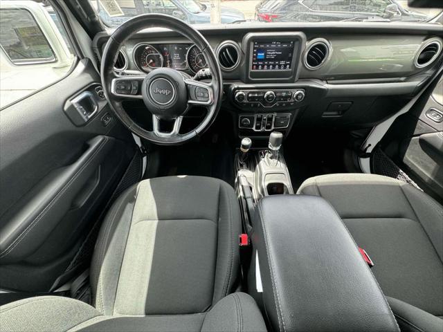Photo of 2021 Bright White Clearcoat Jeep Wrangler Unlimited