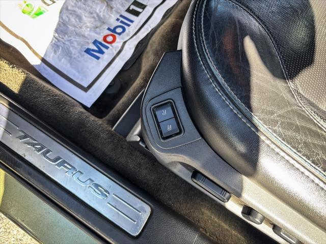 Photo of 2013 Ginger Ale Metallic Ford Taurus