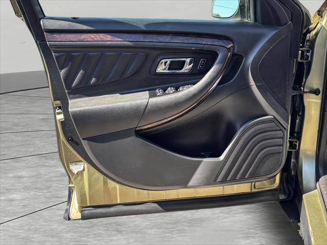 Photo of 2013 Ginger Ale Metallic Ford Taurus