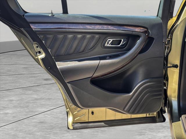 Photo of 2013 Ginger Ale Metallic Ford Taurus