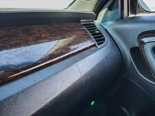 Photo of 2013 Ginger Ale Metallic Ford Taurus