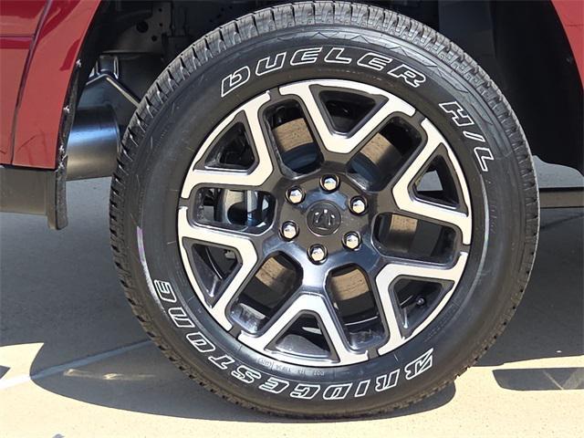 Photo of 2026 Delmonico Red Pearlcoat RAM 1500