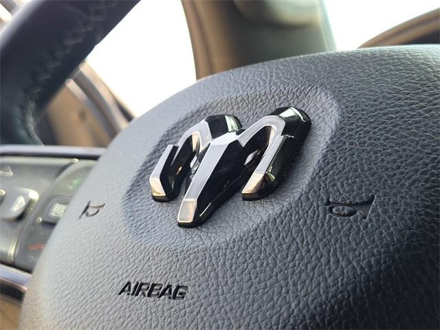 Photo of 2023 Patriot Blue Pearlcoat RAM 1500