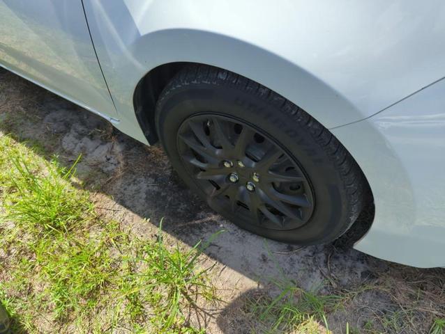 Photo of 2015 White Toyota Corolla