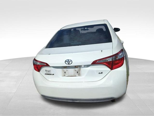 Photo of 2015 White Toyota Corolla