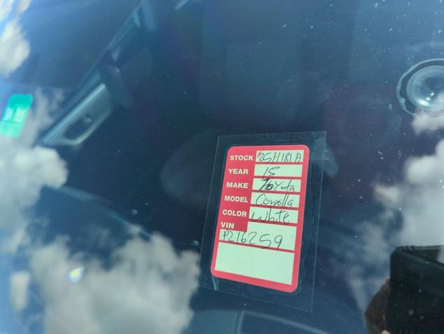 Photo of 2015 White Toyota Corolla