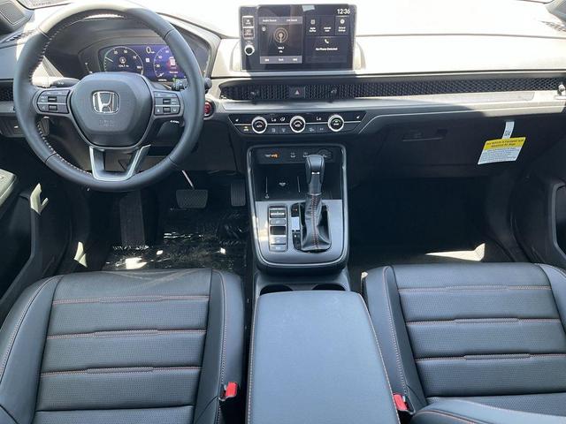 Photo of 2026 Radiant Red Metallic Honda CR-V Hybrid