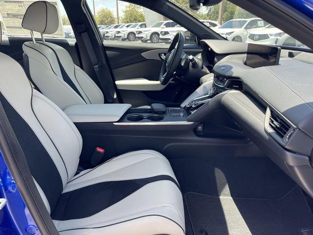 Photo of 2025 Apex Blue Pearl Acura TLX