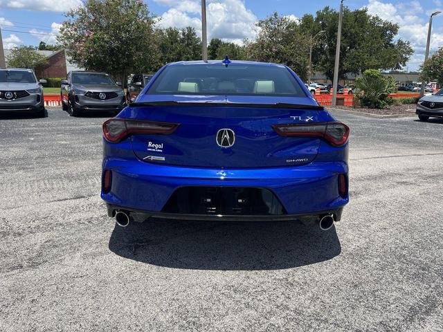 Photo of 2025 Apex Blue Pearl Acura TLX