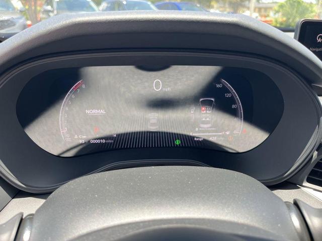 Photo of 2025 Apex Blue Pearl Acura TLX
