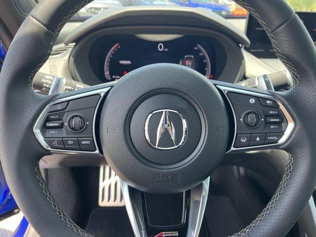Photo of 2025 Apex Blue Pearl Acura TLX
