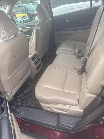 Photo of 2017 Dark Cherry Pearl Honda Pilot