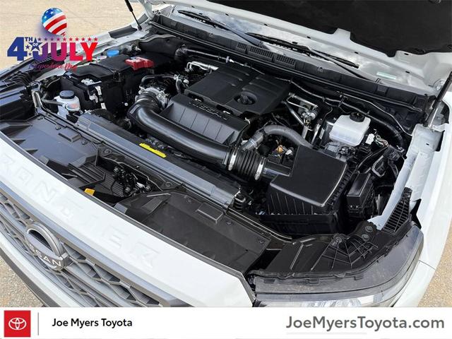 Photo of 2024 Glacier White Nissan Frontier