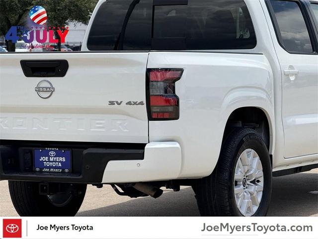 Photo of 2024 Glacier White Nissan Frontier