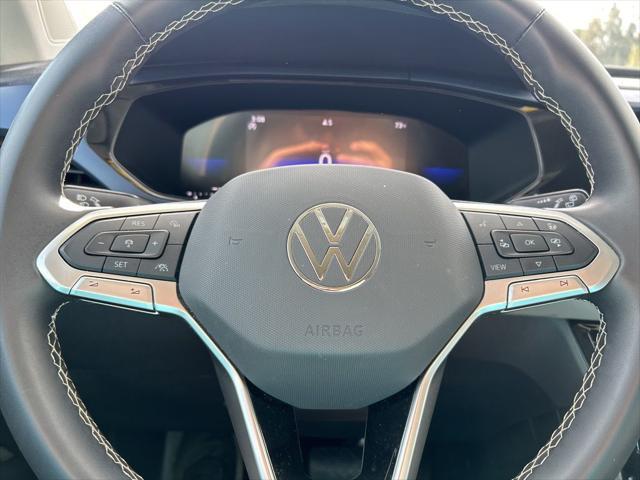 Photo of 2024 Deep Black Pearl Volkswagen Taos