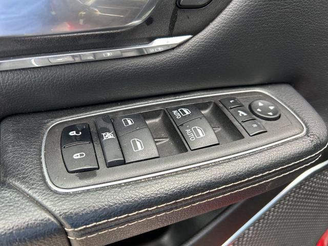 Photo of 2024 Flame Red Clearcoat RAM 1500