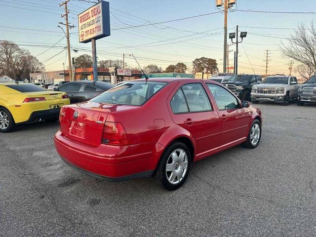 Photo of 2001 Tornado Red Volkswagen Jetta
