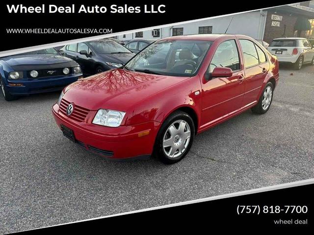 Photo of 2001 Tornado Red Volkswagen Jetta