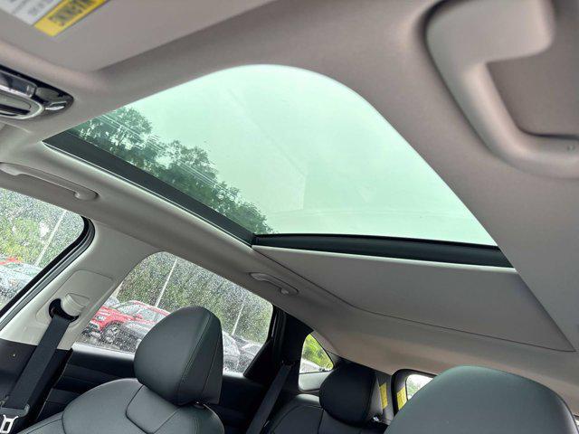 Photo of 2025 Creamy White Pearl Hyundai TUCSON Hybrid