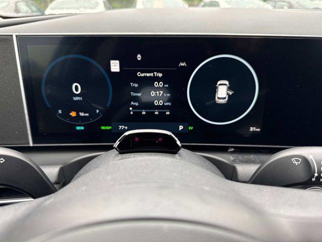 Photo of 2025 Creamy White Pearl Hyundai TUCSON Hybrid