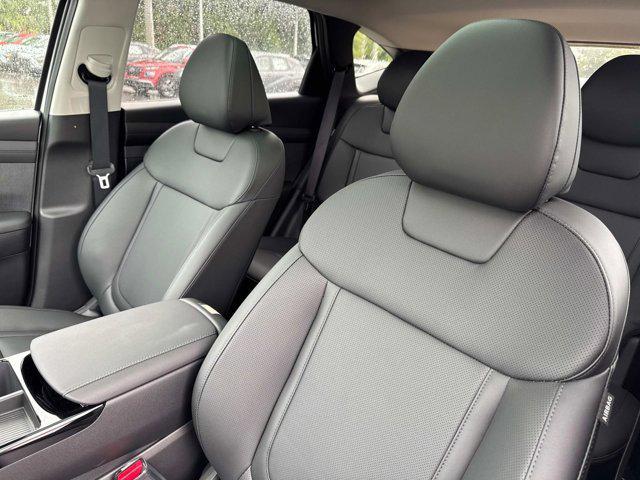 Photo of 2025 Creamy White Pearl Hyundai TUCSON Hybrid