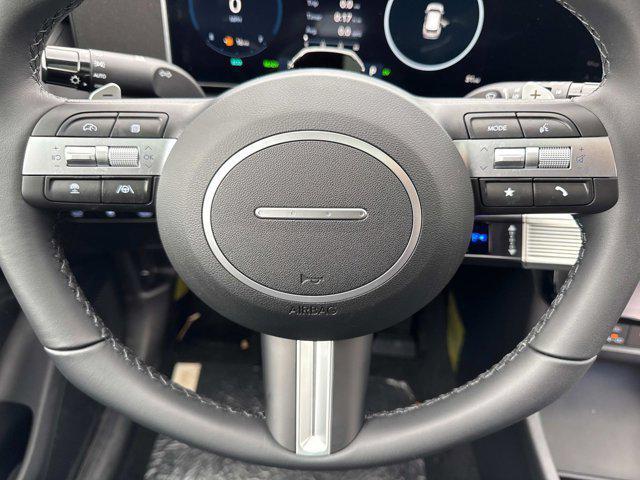 Photo of 2025 Creamy White Pearl Hyundai TUCSON Hybrid