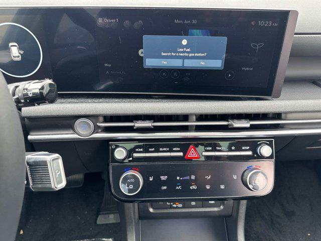 Photo of 2025 Creamy White Pearl Hyundai TUCSON Hybrid