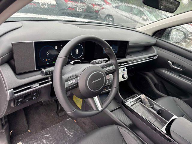 Photo of 2025 Creamy White Pearl Hyundai TUCSON Hybrid