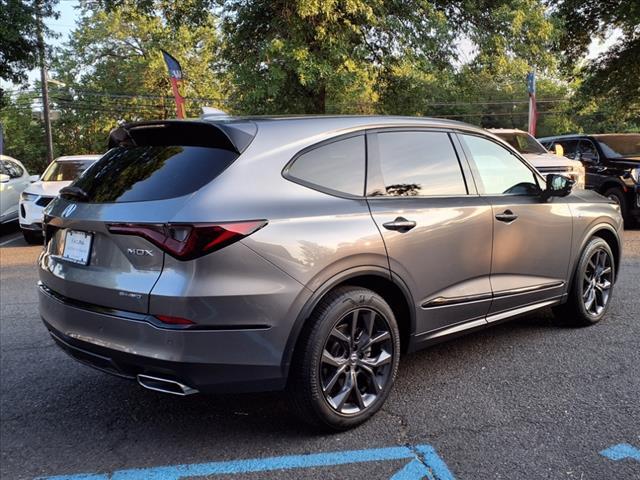 Photo of 2024 Liquid Carbon Metallic Acura MDX