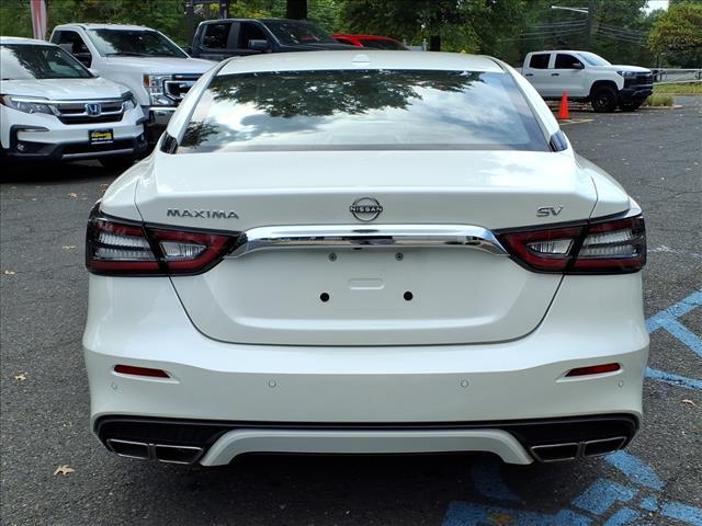 Photo of 2023 Pearl White Tricoat Nissan Maxima