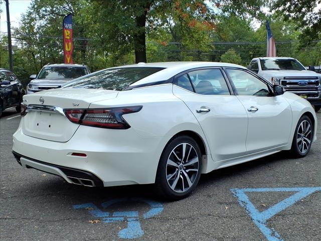 Photo of 2023 Pearl White Tricoat Nissan Maxima