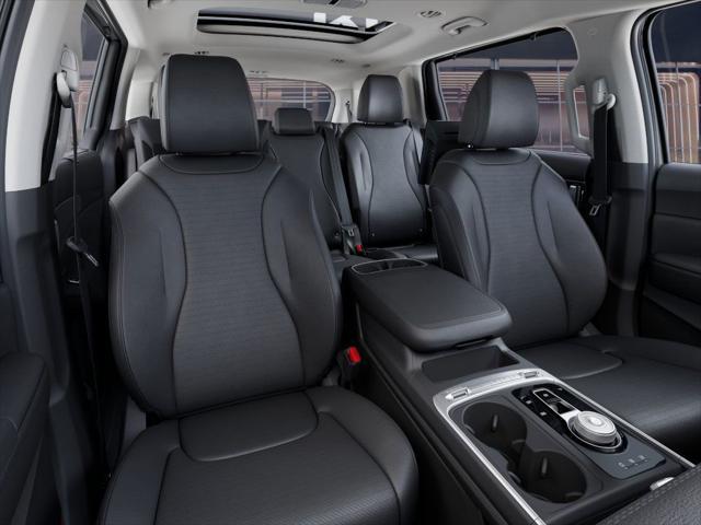 Photo of 2025 Ceramic Silver Kia Carnival Hybrid