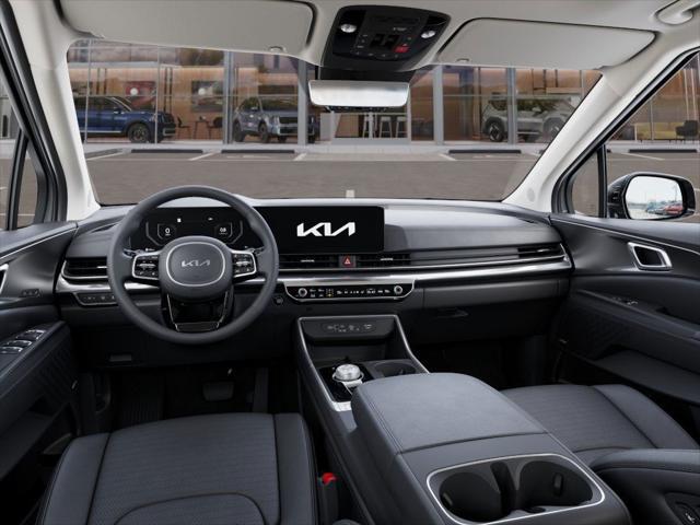 Photo of 2025 Ceramic Silver Kia Carnival Hybrid