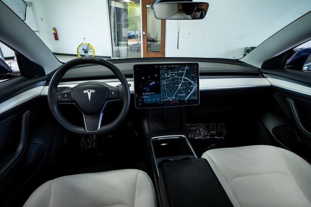 Photo of 2021 Deep Blue Metallic Tesla Model 3