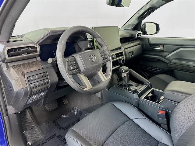 Photo of 2024 Blue Crush Metallic Toyota Tacoma