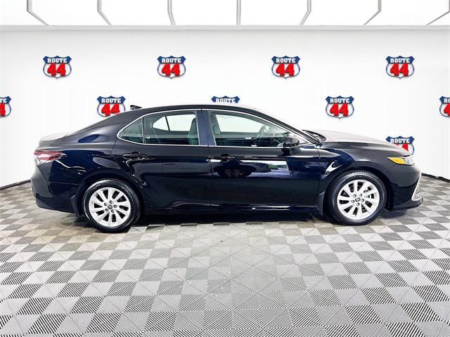Photo of 2023 Midnight Black Metallic Toyota Camry