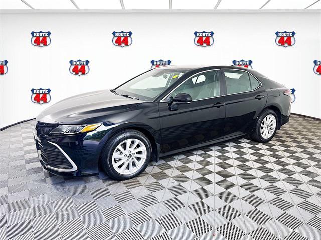 Photo of 2023 Midnight Black Metallic Toyota Camry