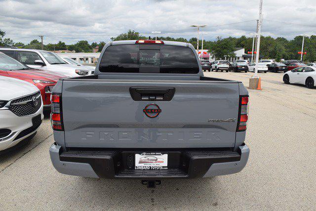 Photo of 2023 Boulder Gray Pearl Nissan Frontier