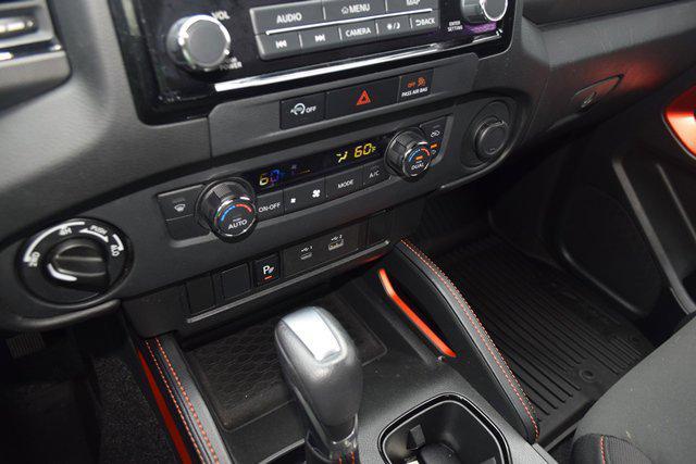 Photo of 2023 Boulder Gray Pearl Nissan Frontier