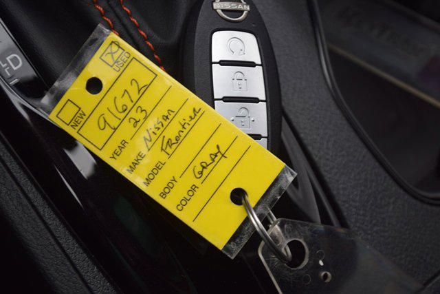 Photo of 2023 Boulder Gray Pearl Nissan Frontier
