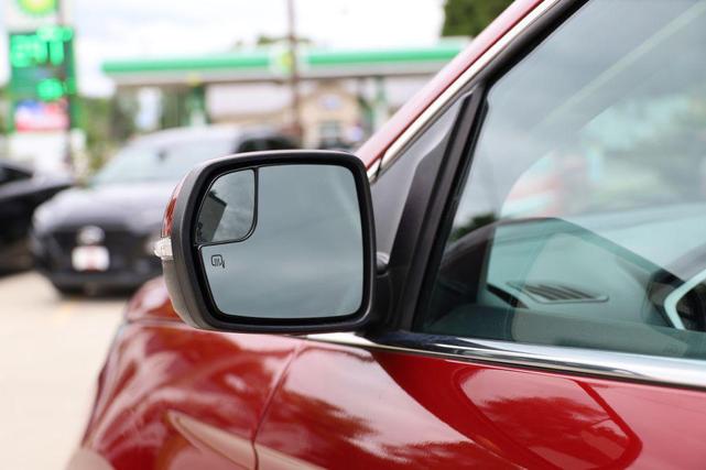 Photo of 2015 Ruby Red Metallic Tinted Clearcoat Ford Edge